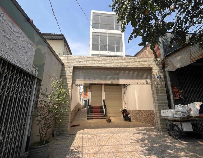 Nhà mặt tiền QL50 gần Nguyễn Văn Linh 4 tầng có hầm sân sổ hoàn công -01