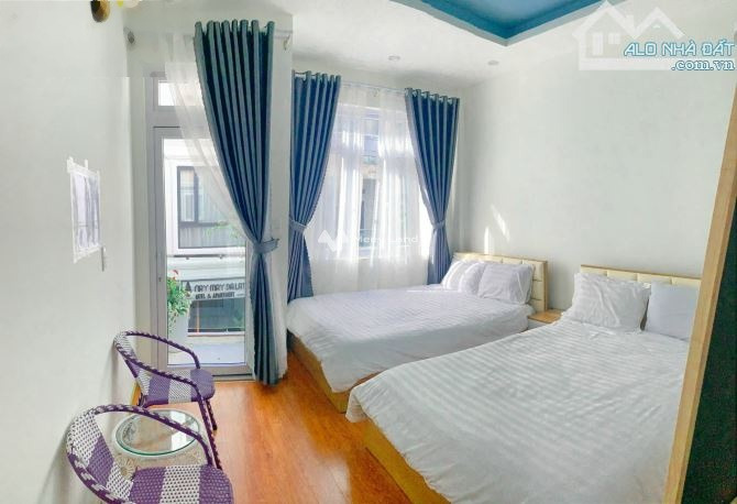 Vị trí đẹp nằm ở Bà Triệu, Đà Lạt cần bán Khách sạn có diện tích thực 50m2, hướng Nam, tổng quan gồm 5 phòng ngủ giao thông đông đúc-01