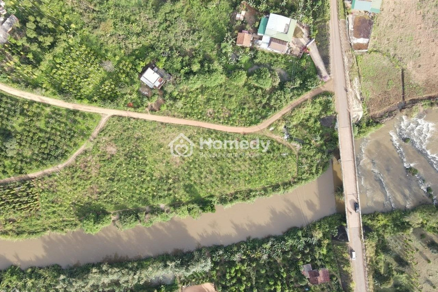 Giá bán giao động 150 triệu bán đất diện tích tổng là 500m2 mặt tiền nằm ngay trên Krông Năng, Đắk Lắk-01